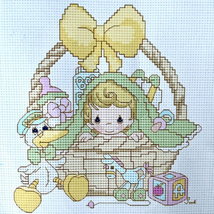 Precious Moments Baby In Basket Cross Stitch Pattern